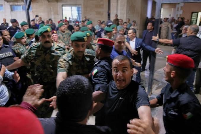 Gunmen storm Jordan church during funeral, kill 7 in deadly shooting